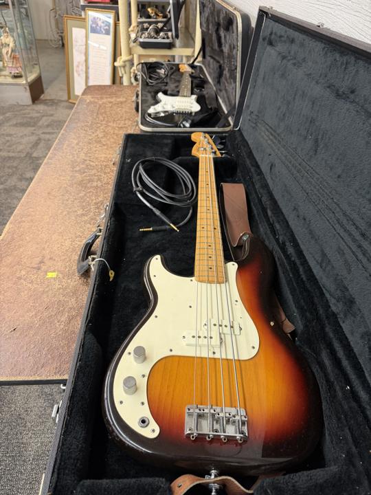Sunburst Fender Precision Bass in hard case