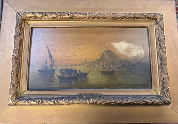 Harbor scene with sailboats in an ornate gilt frame