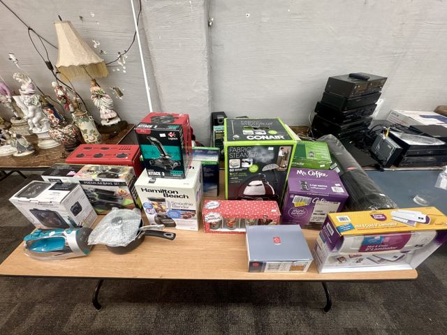 New-in-box small appliances including a blender, fabric steamer and coffee maker