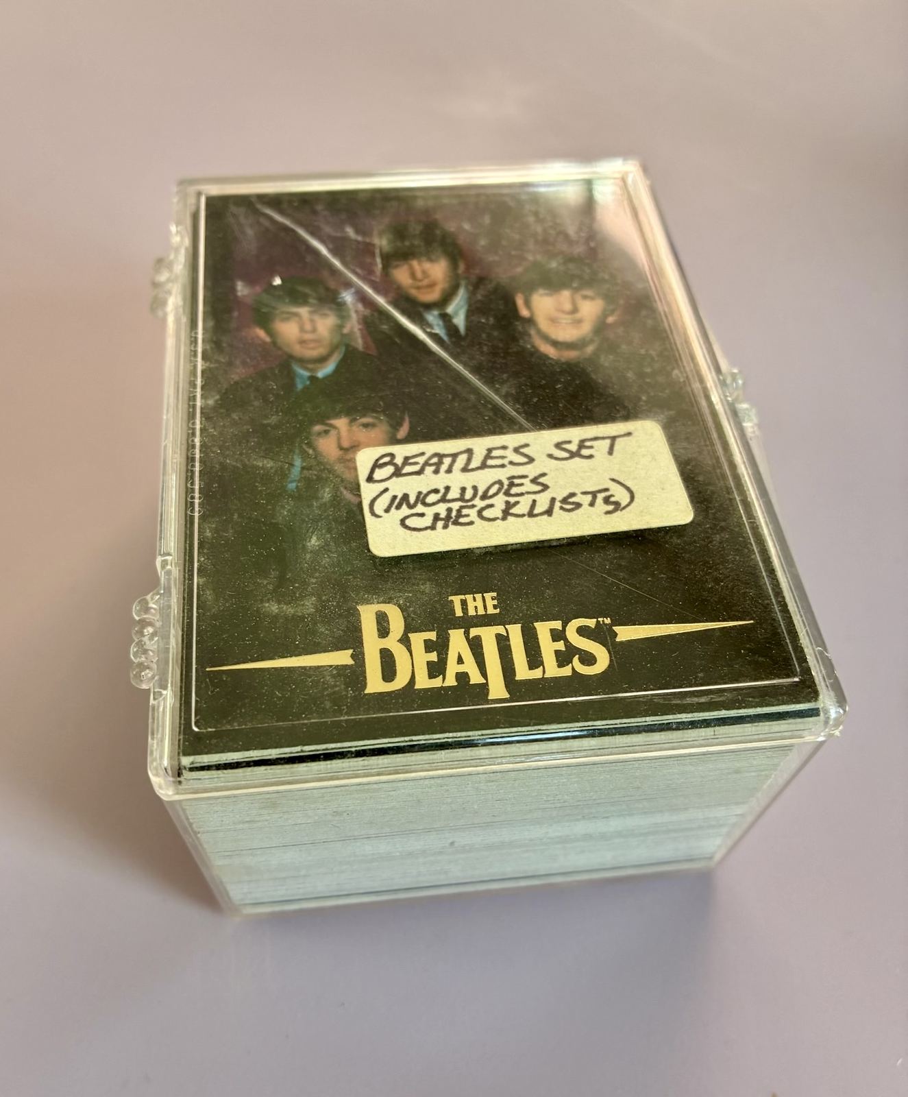 Beatles trading card set with checklists, in display case