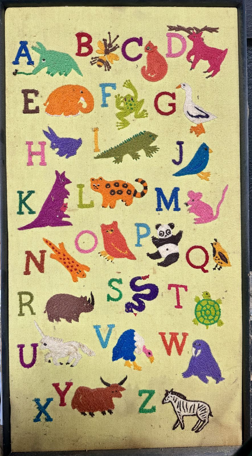 Crewel-embroidered A-to-Z animal alphabet sampler, framed