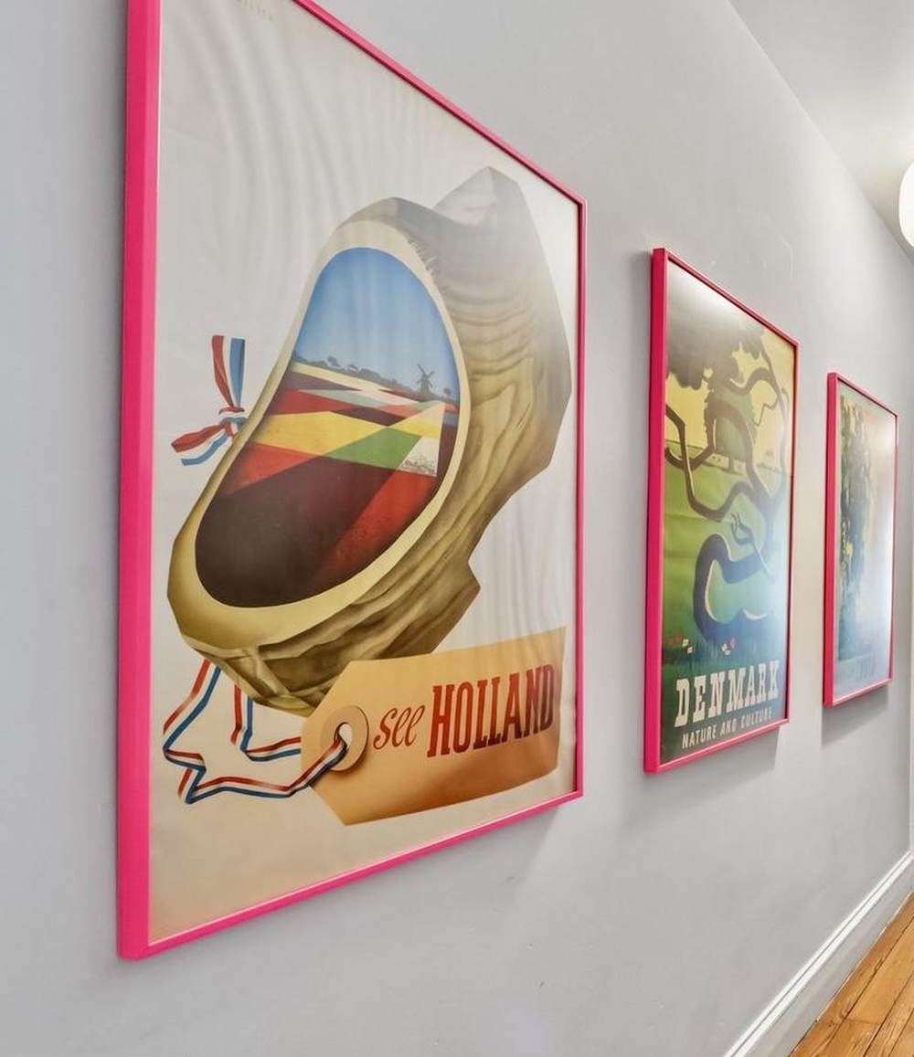 Framed vintage travel posters